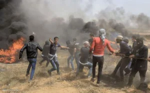 Mass brawl between Fatah and Hamas supporters.