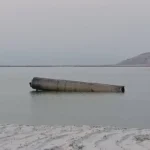 Israel's Strategic Response to Iran's - The downed Iranian missile floats in the Dead Sea